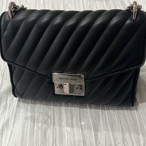 Medium size black leather Michael Kors purse - gently used